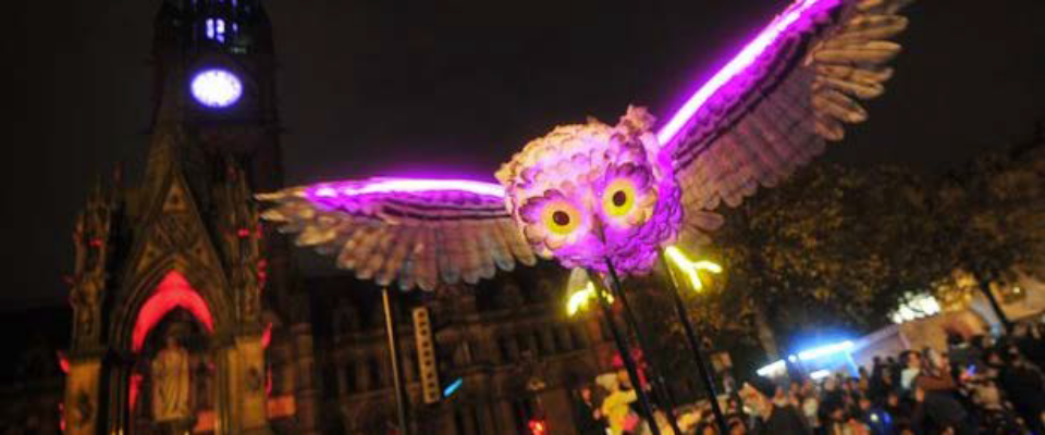 A huge purple and gold illuminated owl; part of the Manchester Diwali celebrations.
