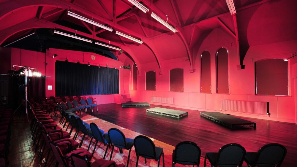 A stage and chairs at The Edge