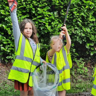 Children take part in a litter pick at Broadhurst Community Centre in Moston.