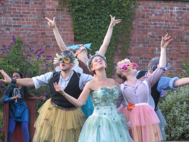 The actors of Feelgood Theatre Company perform A Midsummer Night's Dream outdoors.