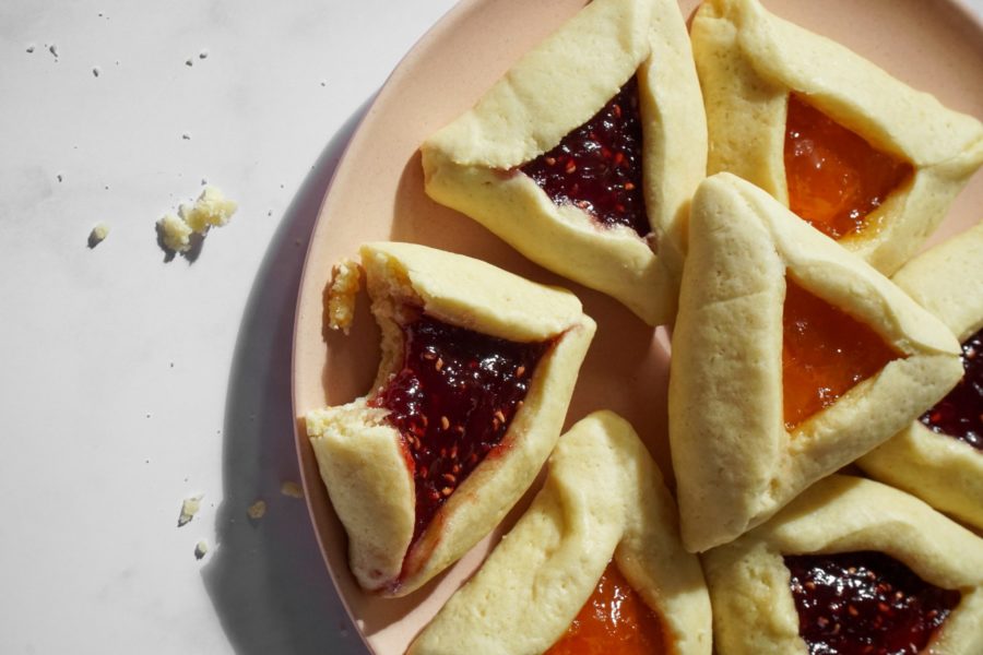 A plate of sweet hamantaschen, Jewish pastries.