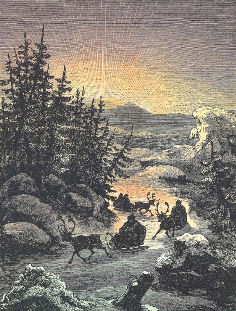A snowy landscape with mountains and Father Christmas on his sleigh.
