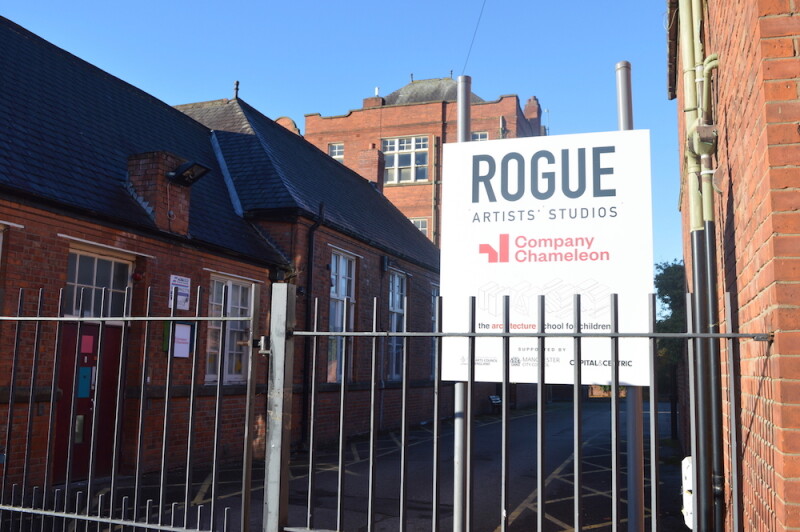The sign outside the Rogue Studios building.