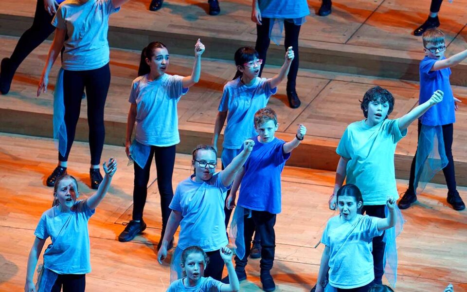 The Halle Children's Choir performing on stage.