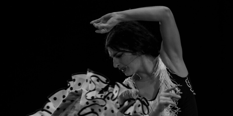 Flamenco teacher Alba Fajardo dancing on her own.