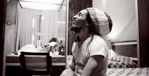 Bob Marley smiling in hotel room