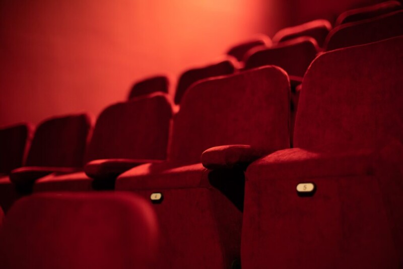 Red audience seats in a theatre