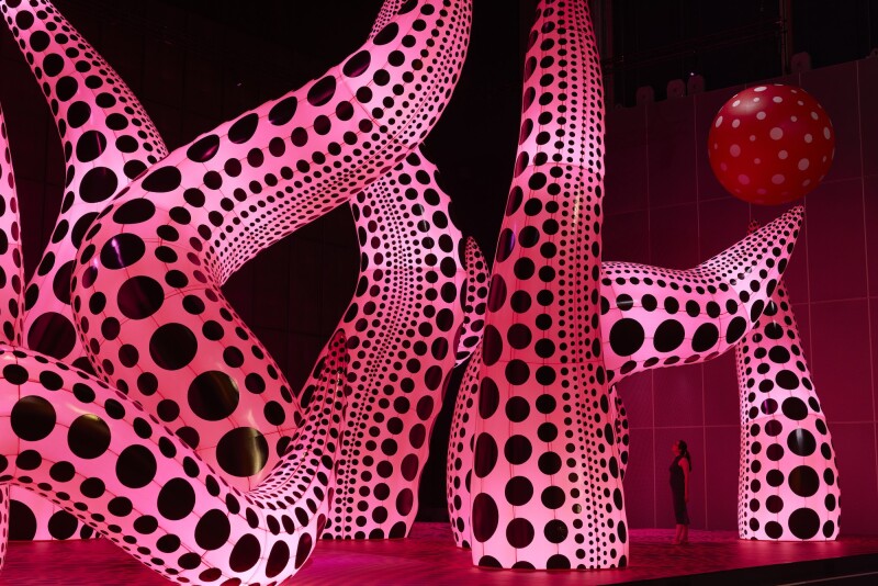Yayoi Kusama's pink and black large inflatable artwork, part of You, Me and the Balloons exhibition.