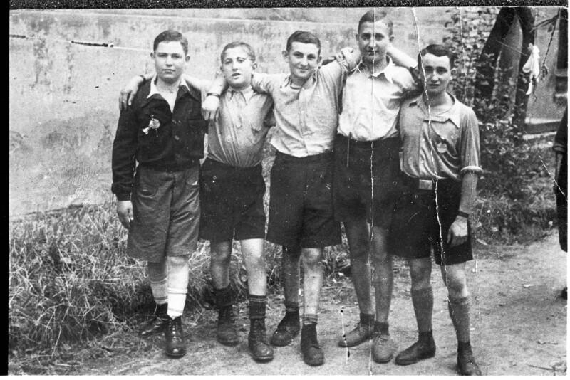 A photograph of Jack Aizenberg (far right) and fellow teenage Holocaust survivors in Prague, 1945. The photograph was donated to the museum by Jack.
