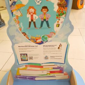 A Blue Peter Trail themed chair decorated with brightly coloured illustrations.