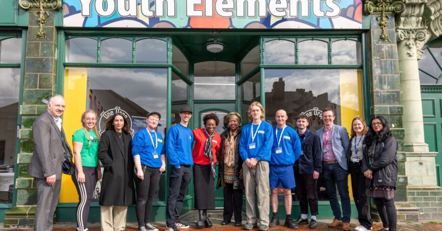 The Youth elements team stand outside their headquarters.