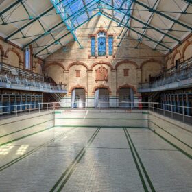 The historic Gala Pool inside Victoria Baths. The pool has been drained of water.