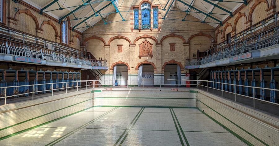 The historic Gala Pool inside Victoria Baths. The pool has been drained of water.