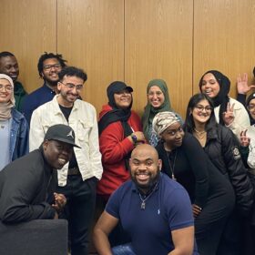 A group of young people engage in creative writing.