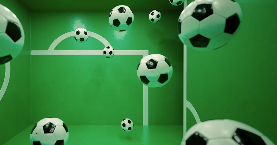 Multiple floating footballs inside a green room with white goalpost markings on the walls. The perspective and reflections create an illusion of depth, making it appear as if the balls are suspended in mid-air.