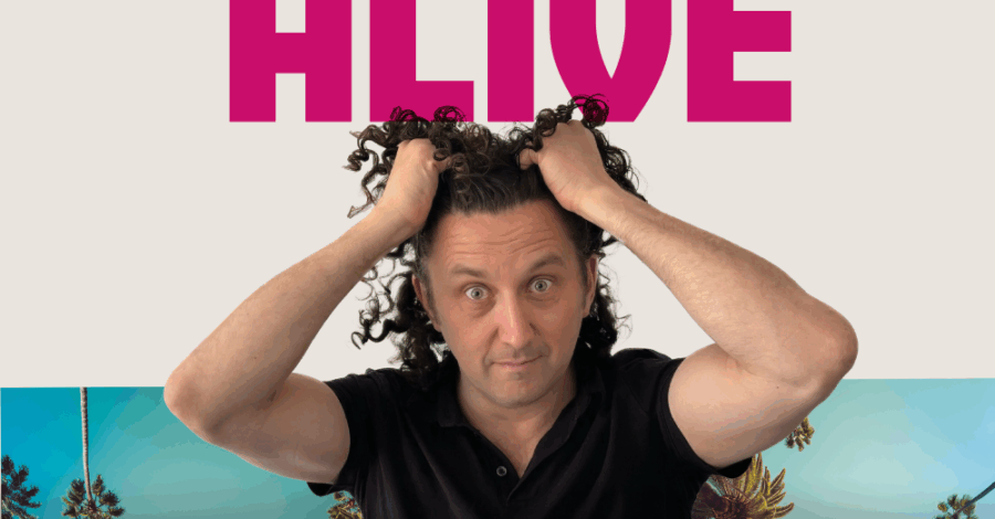 A light-colored poster advertises "MARCUS IS ALIVE," a new solo play by Marcus J. Freed. Below the title, Marcus J. Freed, a light-skinned man with dark, curly hair, holds his hands to his head and looks directly at the viewer with wide eyes. Palm trees are visible in silhouette at the bottom of the image, and the text "FLEABAG MEETS FIDDLER ON THE ROOF" is displayed.