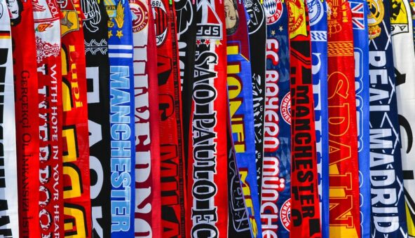 A row of colourful football scarves
