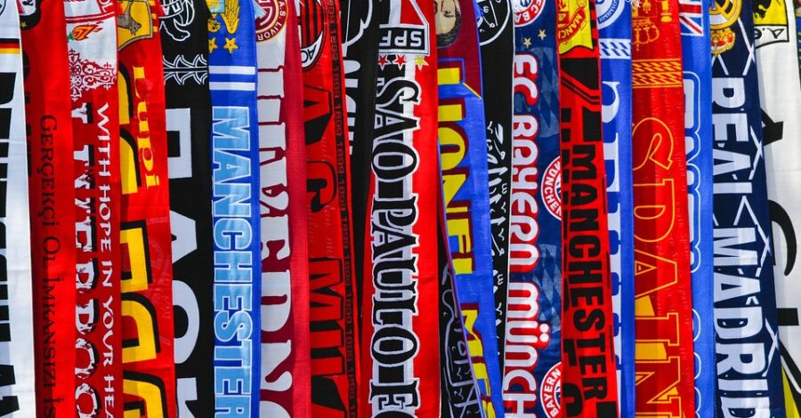 A row of colourful football scarves