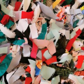 Red, green and white textile cuttings.
