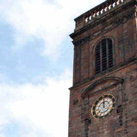 The clock tower of St Anns Church in Manchester City Centre.