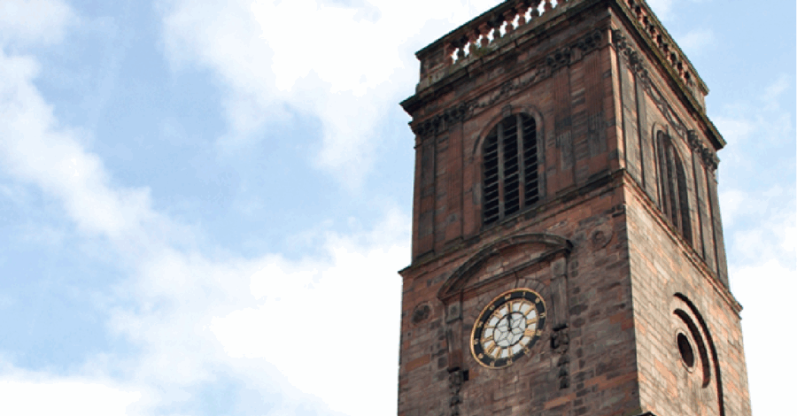 The clock tower of St Anns Church in Manchester City Centre.