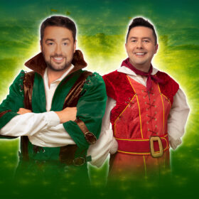 Two performers dressed up as characters from Robin Hood.