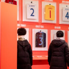 Young people exploring the Black in the Game Exhibition.