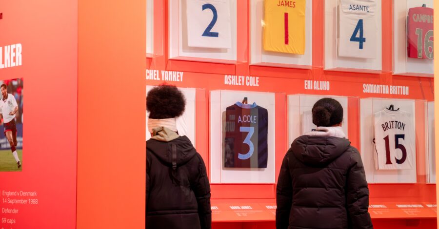 Young people exploring the Black in the Game Exhibition.