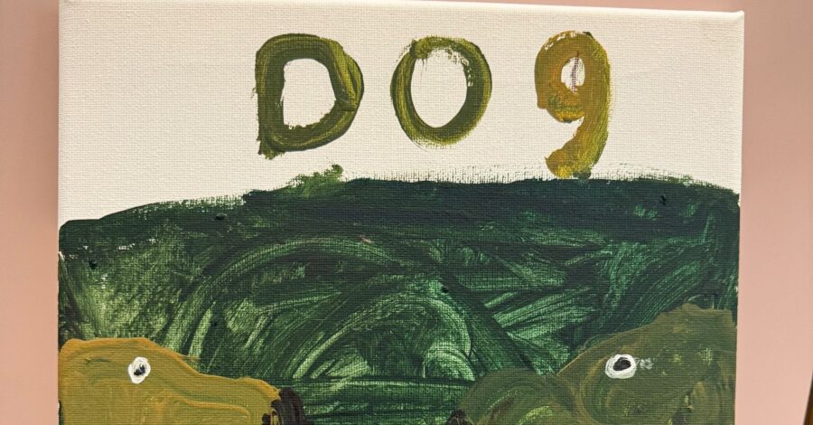 A painting where the bottom half of the work is painted green and the top half of the work reads 'Dog' in green paint.