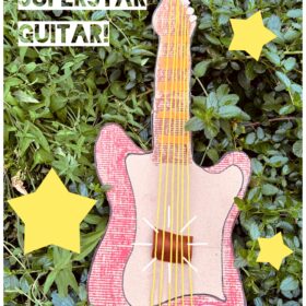 A guitar crafted from cardboard.